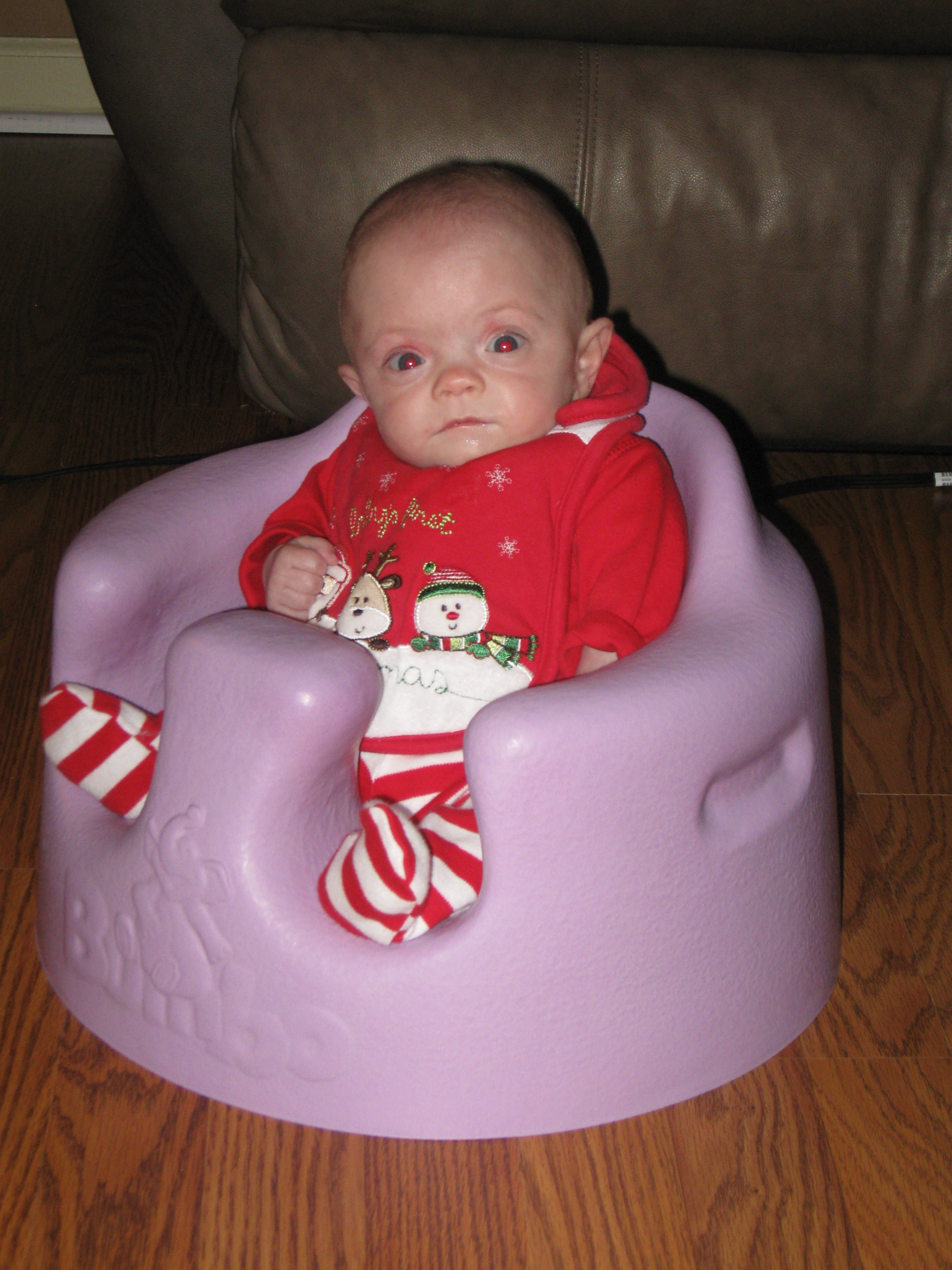 In my new Bumbo seat from Aunt Jenny Speas and crew.  I'm such a big girl in a tiny girl's body!